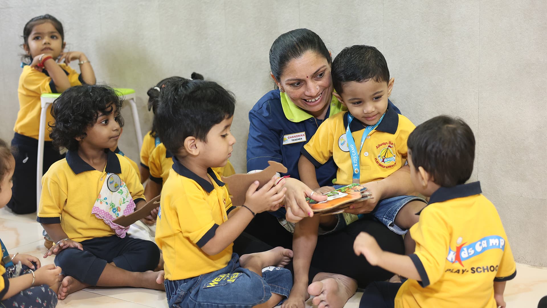 Children playing and learning at Kids Camp Play School